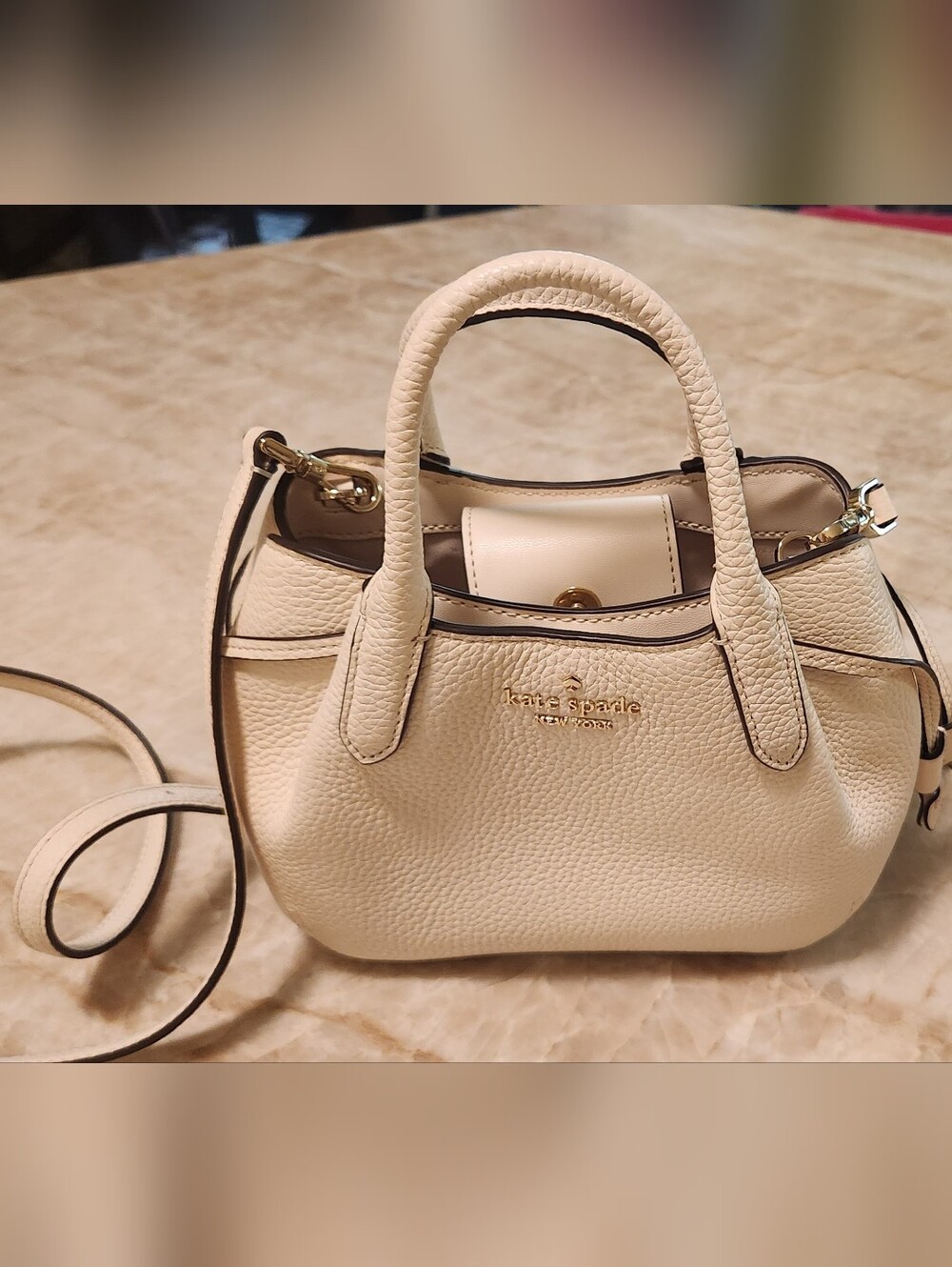 kate spade cream pebble leather mini satchel with gold hardware